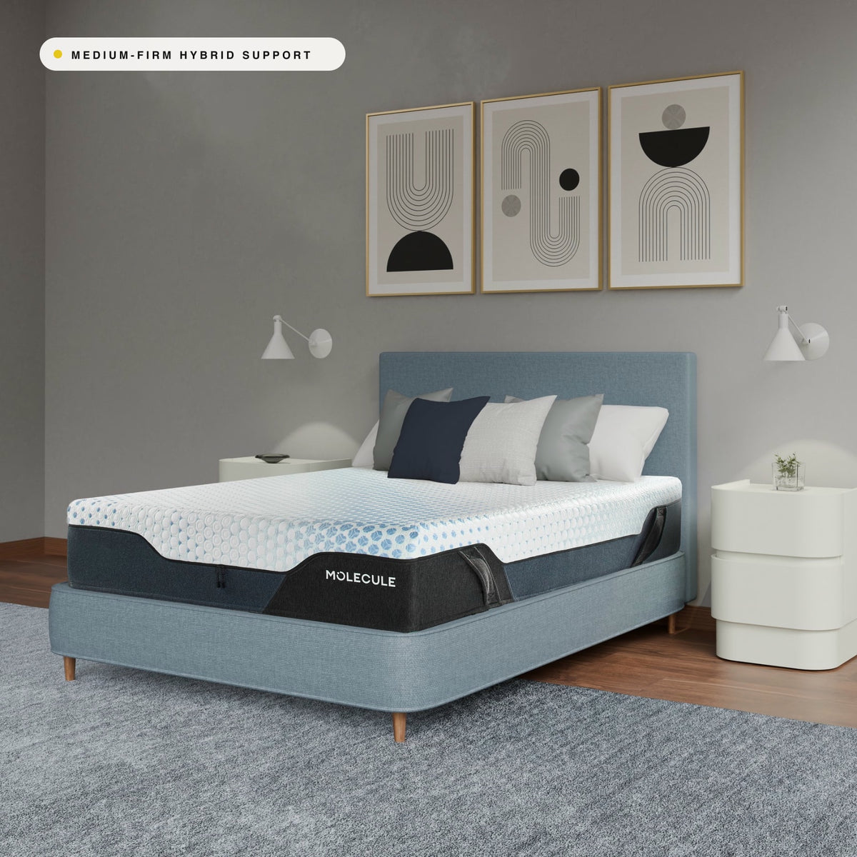 MOLECULE Engage Hybrid 12 mattress on a bed frame in a bright modern bedroom