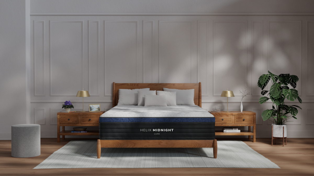 Helix Midnight Luxe mattress with the GlacioTex cooling cover, styled in a bright bedroom