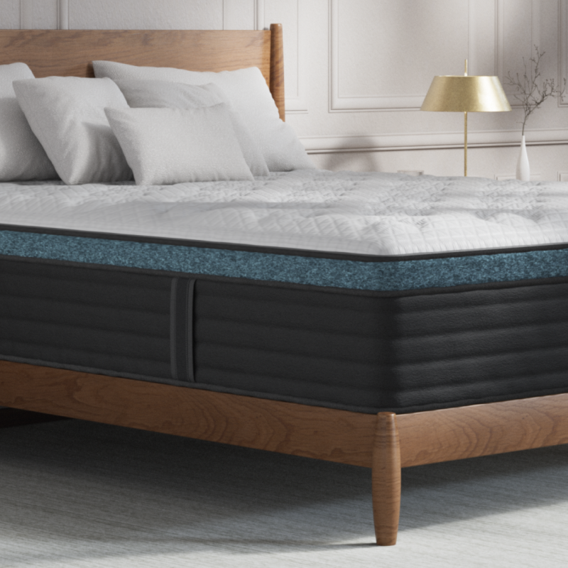 Helix Sunset Luxe plush mattress styled in a bedroom